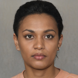 Neutral black young-adult female with short  brown hair and brown eyes