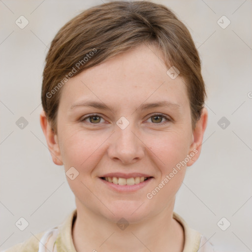 Joyful white young-adult female with short  brown hair and grey eyes