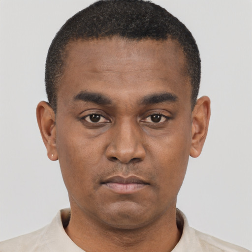 Neutral black young-adult male with short  black hair and brown eyes