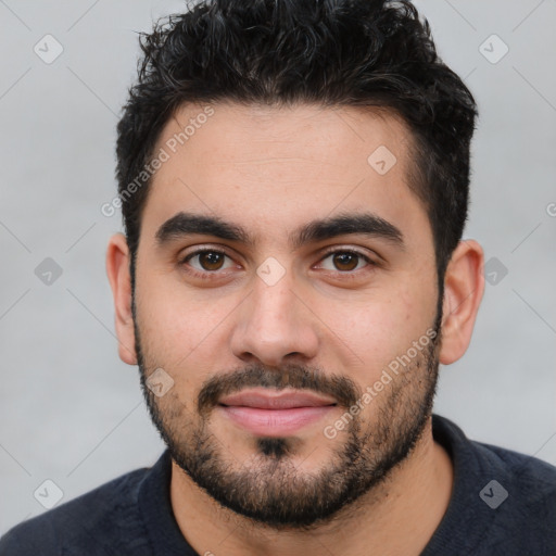 Joyful white young-adult male with short  black hair and brown eyes