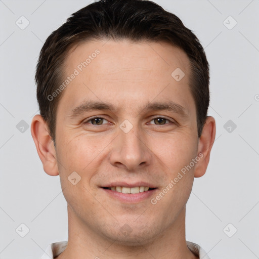 Joyful white young-adult male with short  brown hair and brown eyes