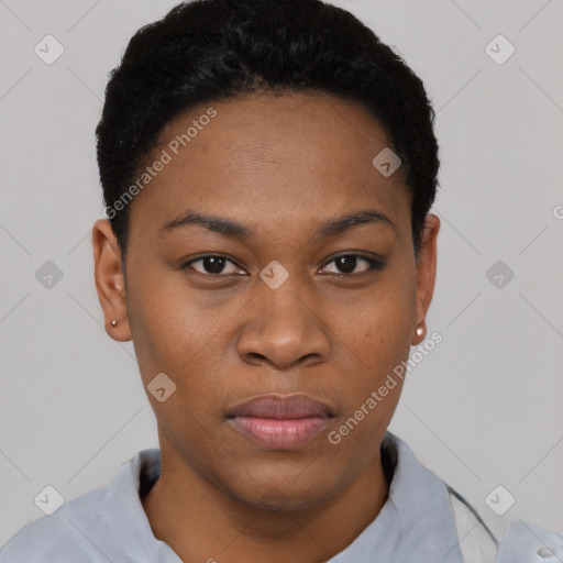 Joyful black young-adult female with short  black hair and brown eyes