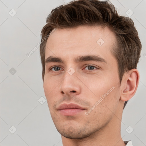 Neutral white young-adult male with short  brown hair and brown eyes