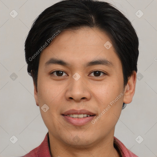 Joyful asian young-adult male with short  brown hair and brown eyes