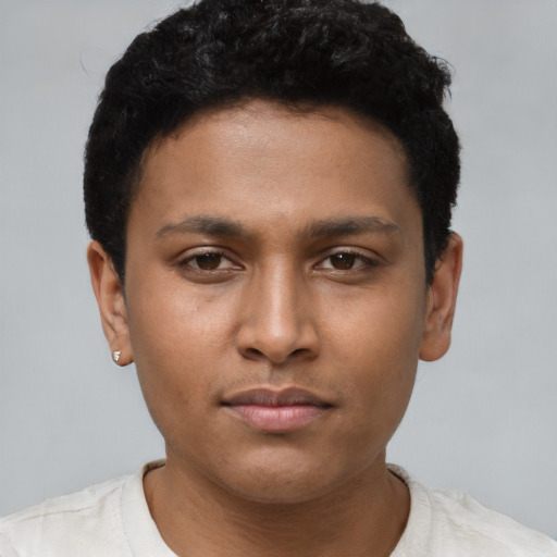 Neutral latino young-adult male with short  brown hair and brown eyes