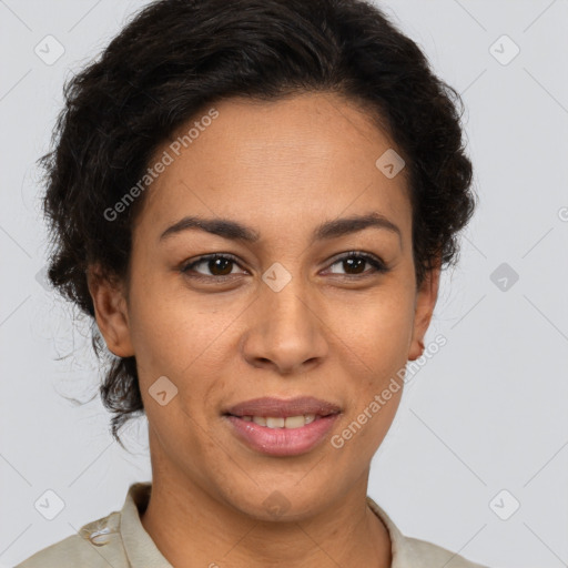 Joyful latino adult female with short  brown hair and brown eyes