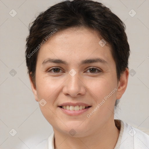 Joyful white young-adult female with short  brown hair and brown eyes