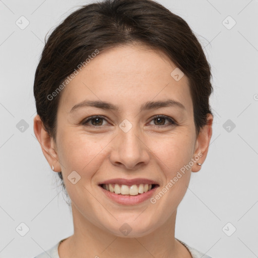 Joyful white young-adult female with medium  brown hair and brown eyes