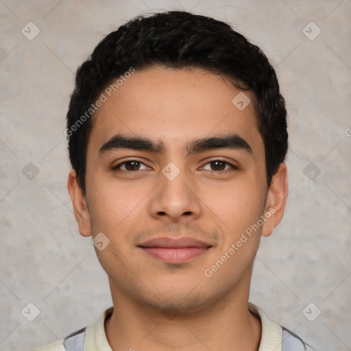 Joyful latino young-adult male with short  black hair and brown eyes