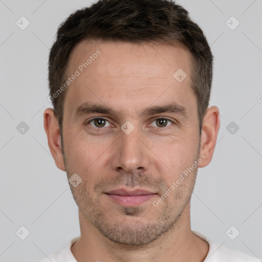 Neutral white young-adult male with short  brown hair and brown eyes