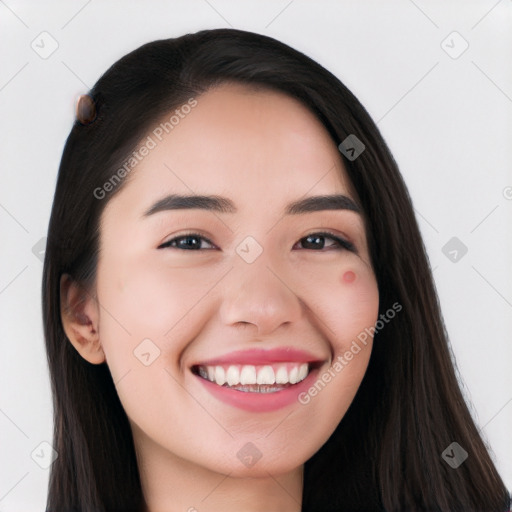 Joyful white young-adult female with long  black hair and brown eyes