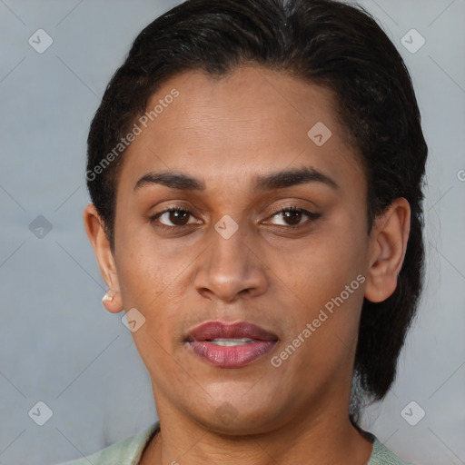 Joyful latino young-adult female with short  brown hair and brown eyes