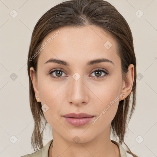 Neutral white young-adult female with medium  brown hair and brown eyes