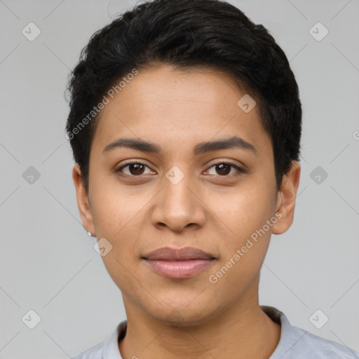 Joyful latino young-adult female with short  black hair and brown eyes