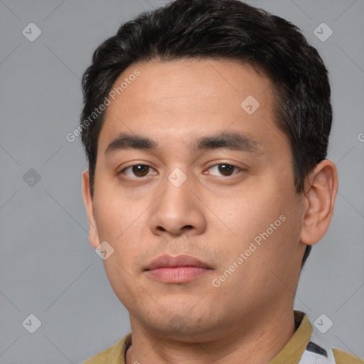 Neutral white young-adult male with short  black hair and brown eyes