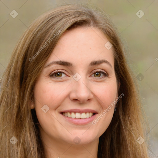 Joyful white young-adult female with long  brown hair and green eyes