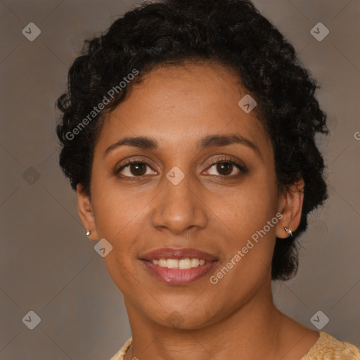 Joyful latino young-adult female with short  brown hair and brown eyes