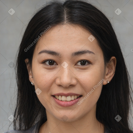 Joyful latino young-adult female with medium  brown hair and brown eyes