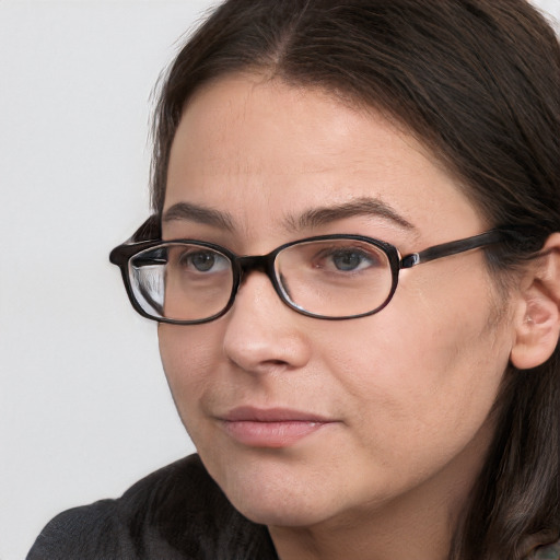 Neutral white adult female with long  brown hair and brown eyes