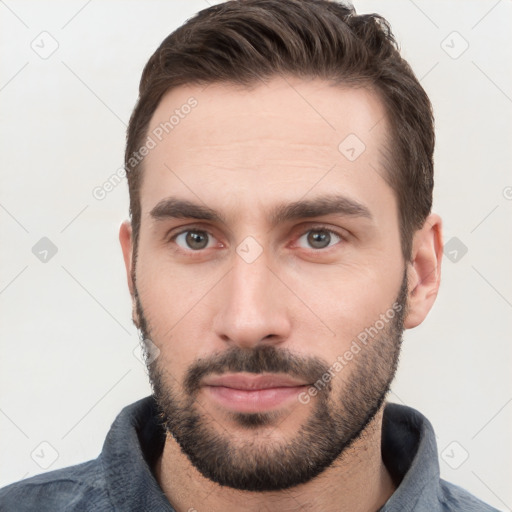 Neutral white young-adult male with short  brown hair and brown eyes