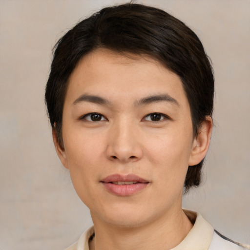 Joyful white young-adult female with short  black hair and brown eyes