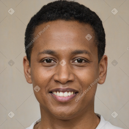 Joyful black young-adult male with short  black hair and brown eyes