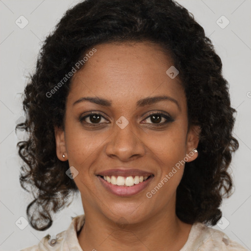 Joyful black young-adult female with medium  brown hair and brown eyes