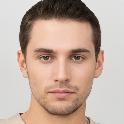 Neutral white young-adult male with short  brown hair and brown eyes