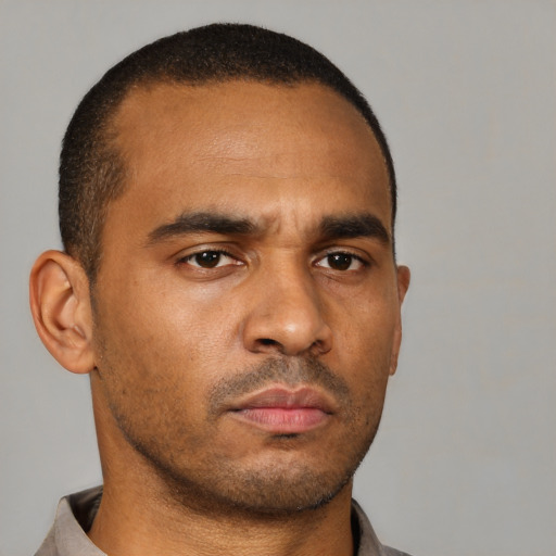 Neutral latino young-adult male with short  brown hair and brown eyes