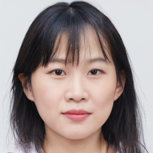 Neutral asian young-adult female with medium  brown hair and brown eyes