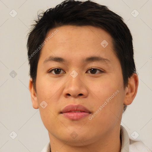 Joyful asian young-adult male with short  brown hair and brown eyes