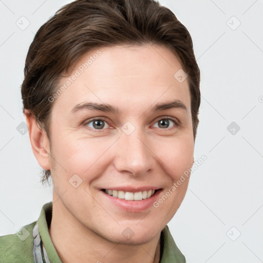 Joyful white young-adult female with short  brown hair and grey eyes