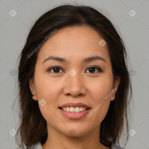 Joyful white young-adult female with medium  brown hair and brown eyes