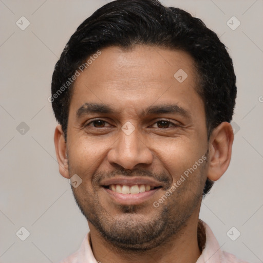 Joyful latino young-adult male with short  black hair and brown eyes