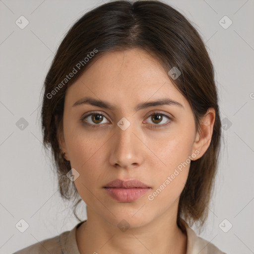 Neutral white young-adult female with medium  brown hair and brown eyes