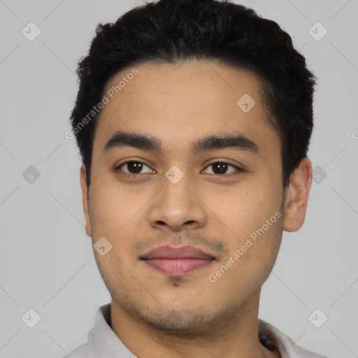 Joyful latino young-adult male with short  black hair and brown eyes