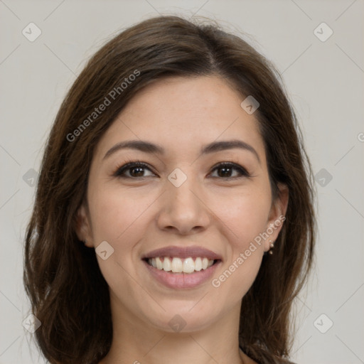 Joyful white young-adult female with long  brown hair and brown eyes