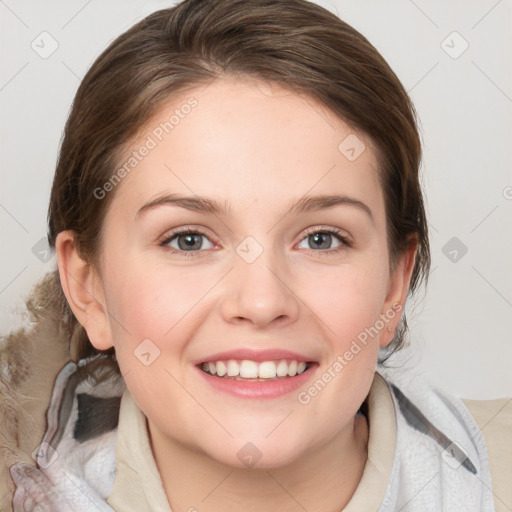 Joyful white young-adult female with medium  brown hair and blue eyes