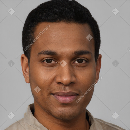 Joyful black young-adult male with short  black hair and brown eyes