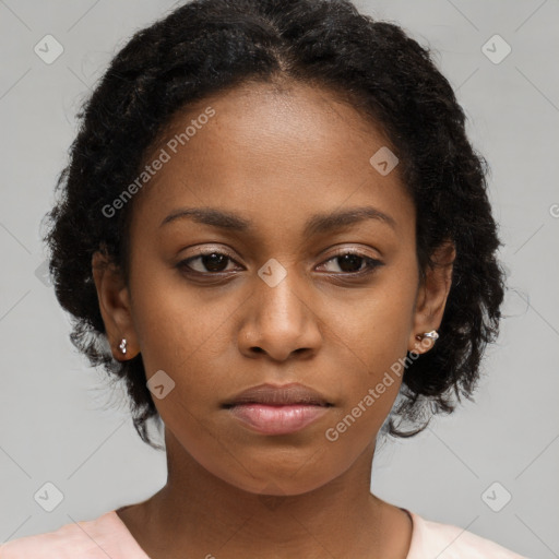 Neutral black young-adult female with short  brown hair and brown eyes