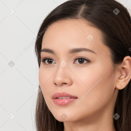 Neutral white young-adult female with long  brown hair and brown eyes