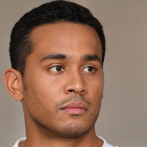 Neutral latino young-adult male with short  brown hair and brown eyes