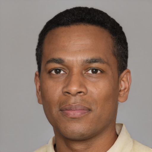 Neutral black young-adult male with short  black hair and brown eyes