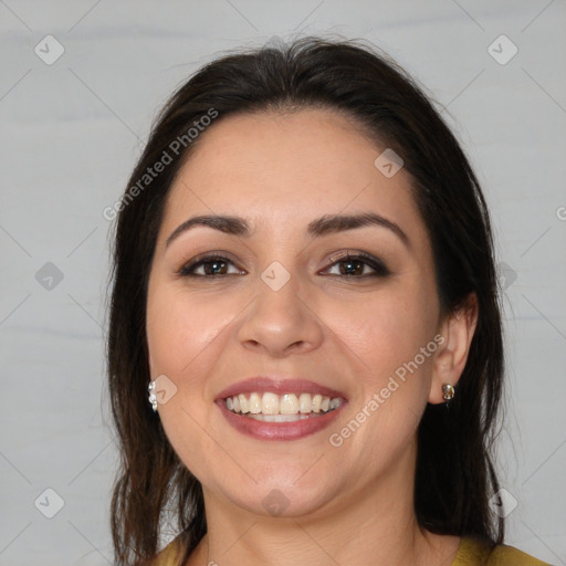 Joyful white young-adult female with long  brown hair and brown eyes