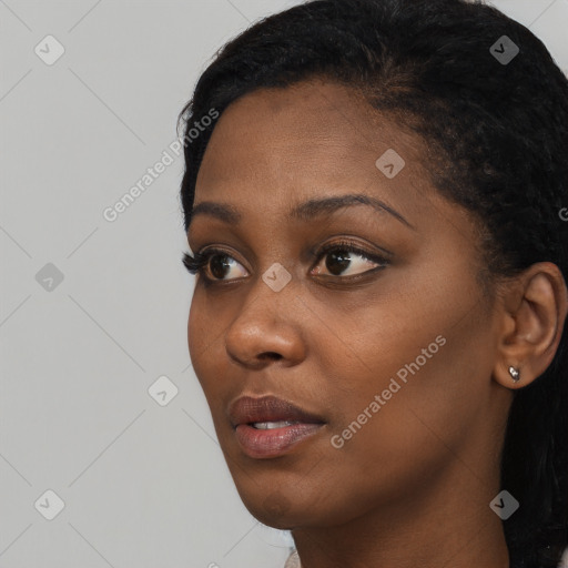 Neutral black young-adult female with short  black hair and brown eyes