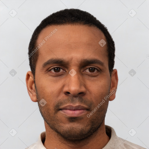 Neutral latino young-adult male with short  black hair and brown eyes