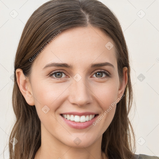 Joyful white young-adult female with long  brown hair and grey eyes