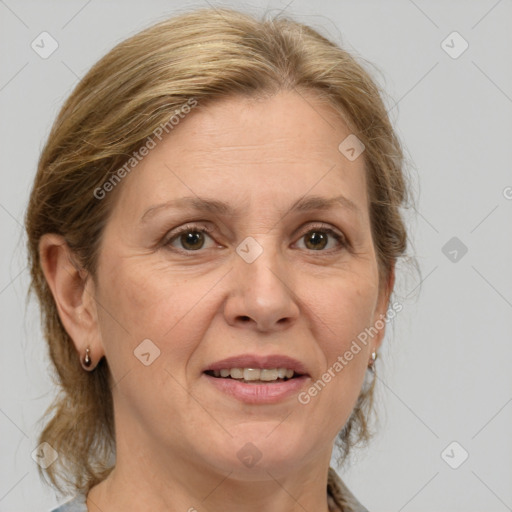 Joyful white adult female with medium  brown hair and grey eyes