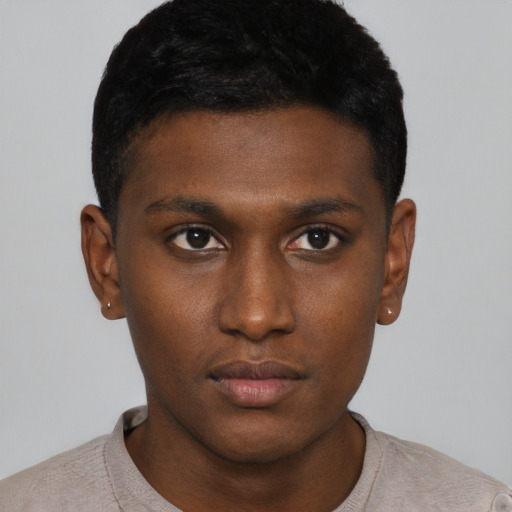 Neutral black young-adult male with short  black hair and brown eyes