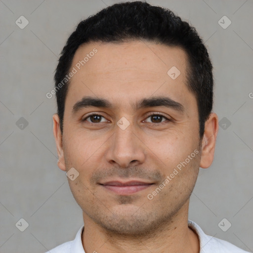 Joyful white young-adult male with short  black hair and brown eyes